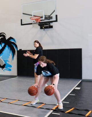 kids play basketball